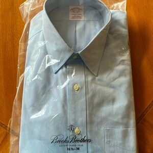 Brand new in the package men’s blue dress shirt